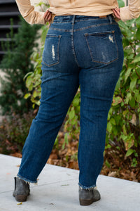 Judy Blue  These distressed boyfriend jeans will be your comfiest Judy Blues yet! With relaxed legs and a mid-waist, you will want to wear these every day!   Color: Dark Blue Cut: Boyfriend, 29" Inseam* Rise: Mid Rise. 9.5" Front Rise* Material: 91% COTTON,7% POLYESTER, 2% RAYON Machine Wash Separately In Cold Water Stitching: Classic Fly: Zipper Style #: JB88305-PL , 88305-PL Contact us for any additional measurements or sizing.   *Measured on the smallest size, measurements may vary by size. 