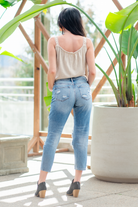 KanCan Jeans  These boyfriend jeans will become your new favorite look. Pair with a  tank and heels for a casual spring look. Color: Medium Blue Wash Cut: Straight Fit, 27" Inseam* Rise: Mid-Rise, 9.75" Front Rise* 94% COTTON, 5% POLYESTER, 1% SPANDEX Fly: Exposed Button Fly Style #: KC8571M Contact us for any additional measurements or sizing.  *Measured on the smallest size, measurements may vary by size.