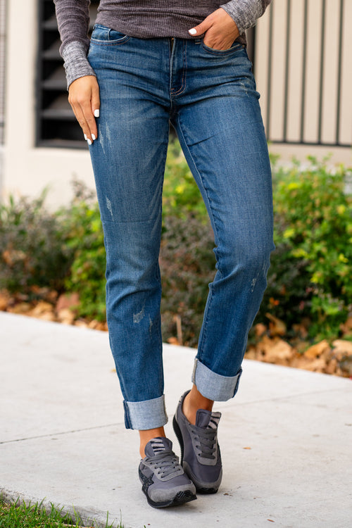 Judy Blue  These mid-waisted long boyfriend jeans will be your comfiest Judy Blues yet! With relaxed legs and a mid-waist, you will want to wear these every day!   Color: Dark Blue Cut: Boyfriend, 27" Inseam Double Cuffed, 30" Uncuffed* Rise: Mid Rise. 9.5" Front Rise Material: 65% Cotton 21% Polyester 11% Rayon 2% Spandex Machine Wash Separately In Cold Water Stitching: Classic Fly: Zipper Style #: JB88357 , 88357 Contact us for any additional measurements or sizing. 