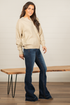 Miss Sparkling  Layer up this henley with skinny jeans and boots for a perfect winter look.   Color: Cream Neckline: Button Up Pull Over Sleeve: Long Style #: D20501113 Contact us for any additional measurements or sizing.  