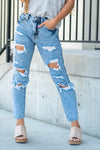 KanCan Jeans  These mom jeans will become your go-to! Pair these girlfriend mom fit with chunky sandals and a tee for an easy summer look.  Color: Medium Blue Cut: Straight Fit, 27" Inseam* Rise: High-Rise, 10.75" Front Rise* 100% Cotton Fly: Zipper Style #: KC8662M Contact us for any additional measurements or sizing.  *Measured on the smallest size, measurements may vary by size.