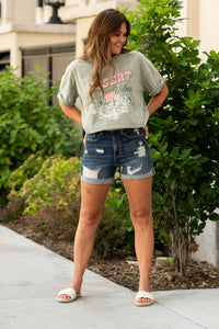 Sneak Peek Denim  These tomboy shorts have a high-rise relaxed fit with a rolled hem. Collection: Spring 2021 Color: Dark Blue Cut: Shorts, 4" Inseam Rise: High-Rise, 11" Front Rise 93% COTTON 6% ELASTERELL-POLY 1% SPANDEX Fly: Zipper  Style #: SP-S7367M Contact us for any additional measurements or sizing.