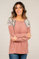 BiBi   Throw on for an easy casual look with your favorite jeans this fall.   Color: Marsala   Neckline: Round Sleeve: Long Style #: BT1865 Contact us for any additional measurements or sizing.       