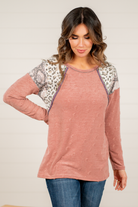 BiBi   Throw on for an easy casual look with your favorite jeans this fall.   Color: Marsala   Neckline: Round Sleeve: Long Style #: BT1865 Contact us for any additional measurements or sizing.       