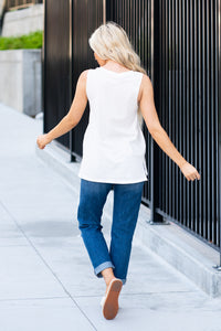 Hem & Thread   Light and easy, pair this pretty graphic tee with your favorite ankle skinnies.   Color: White Neckline: Crew Sleeve: Sleeveless  95% COTTON 5% SPANDEX  Style #: 30540-White Contact us for any additional measurements or sizing.  