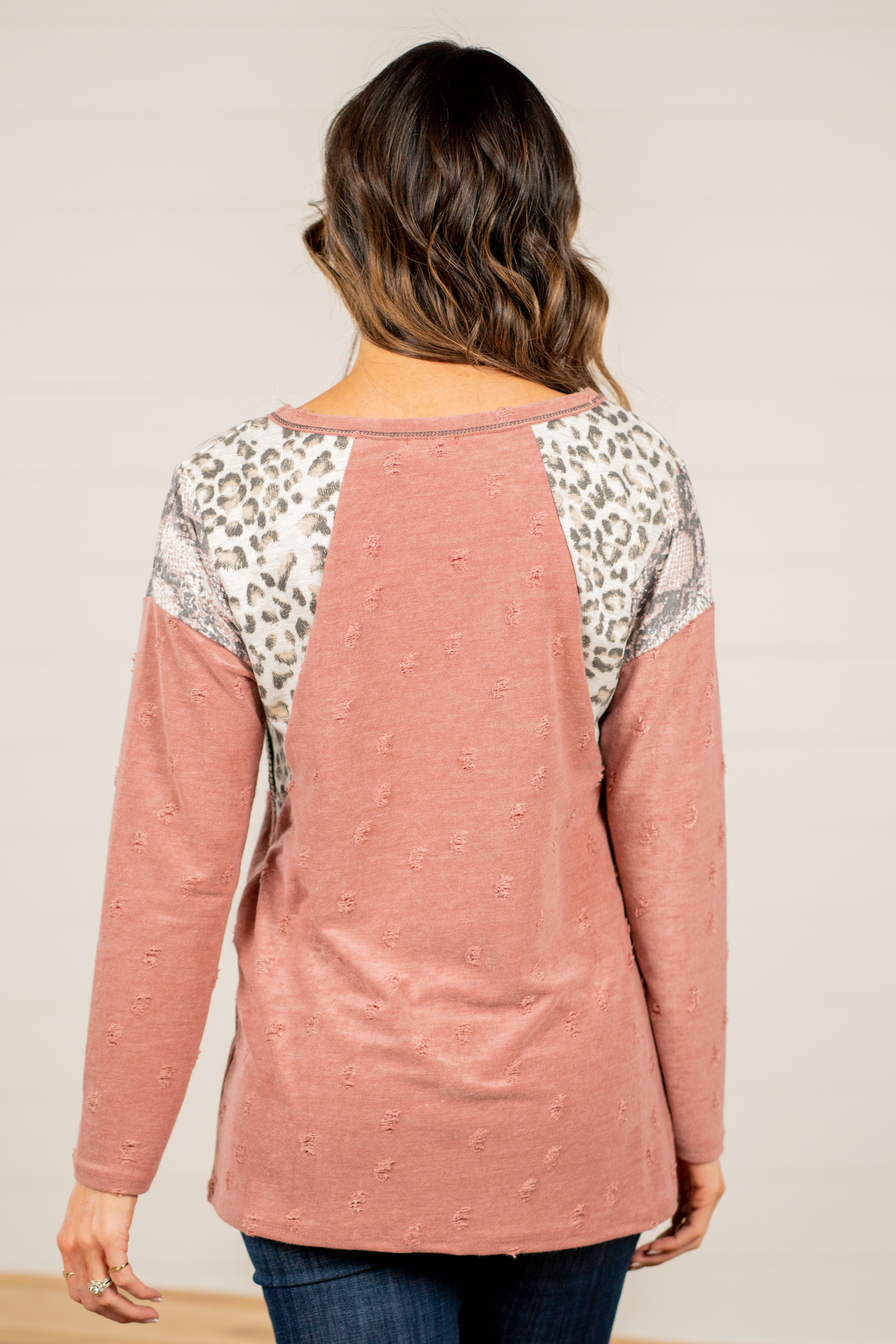 BiBi   Throw on for an easy casual look with your favorite jeans this fall.   Color: Marsala   Neckline: Round Sleeve: Long Style #: BT1865 Contact us for any additional measurements or sizing.       