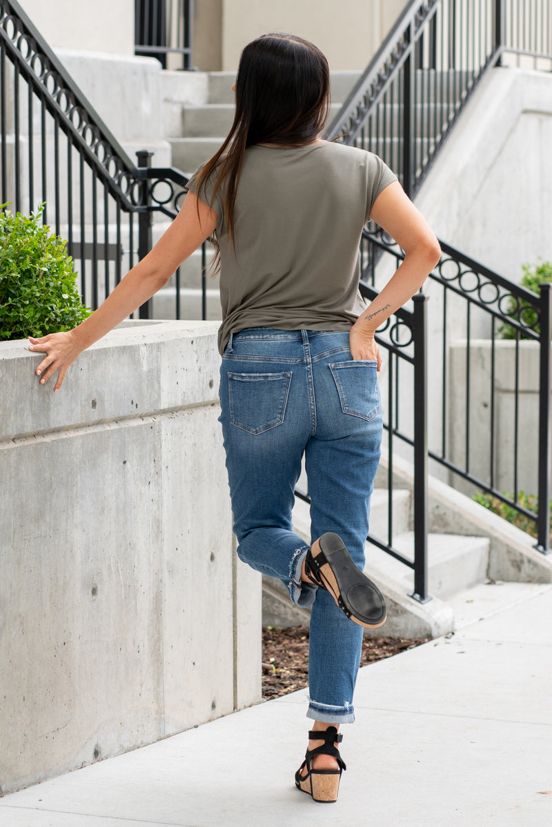 Flying Monkey Jeans  Comfortable stretchy denim with a slouchy fit makes these cute straight jeans perfect for everyday wear. Name: Lover Memormies  Cut: Straight Fit, 27" Inseam* Rise: High Rise, 10.25" Front Rise* 93% COTTON , 5% POLYESTER , 2% SPANDEX Fly: Zipper   Style #: F4376 Contact us for any additional measurements or sizing.  *Measured on the smallest size, measurements may vary by size. 