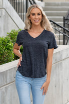 Thread & Supply  This isn't your basic v-neck tee. Made in a paper thin, soft fabric with a high low cut which it perfect for a little front tuck!  Color: Black Neckline: V-Neck Sleeve: Short Sleeve 100% TENCEL™ LYOCELL Style #: T370LPKTS-BK001 Contact us for any additional measurements or sizing. 