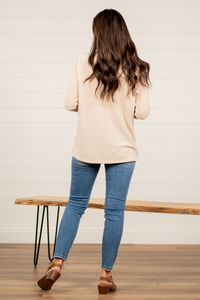 BiBi   Throw on for an easy casual look with your favorite jeans this fall.   Color: Taupe   Neckline: Round Sleeve: Long  Style #: BT2167 Contact us for any additional measurements or sizing.       