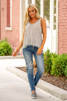 Hem & Thread   This sleeveless super soft tank can be paired with jeans or shorts and sandals for a fun summer look or paired with a cardi.  Neckline: V Neck Sleeve: Sleeveless  96% Polyester 4% Spandex Style #: 30358F Contact us for any additional measurements or sizing.