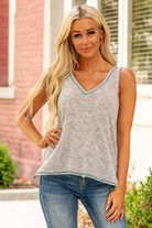 Hem & Thread   This sleeveless super soft tank can be paired with jeans or shorts and sandals for a fun summer look or paired with a cardi.  Neckline: V Neck Sleeve: Sleeveless  96% Polyester 4% Spandex Style #: 30358F Contact us for any additional measurements or sizing.