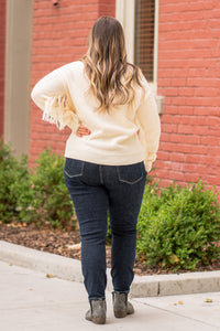 BiBi   Throw on for a warm casual look with your favorite jeans this fall.   Color: Cream Neckline: Crew Sleeve: Long Style #: IP7026  Contact us for any additional measurements or sizing.    