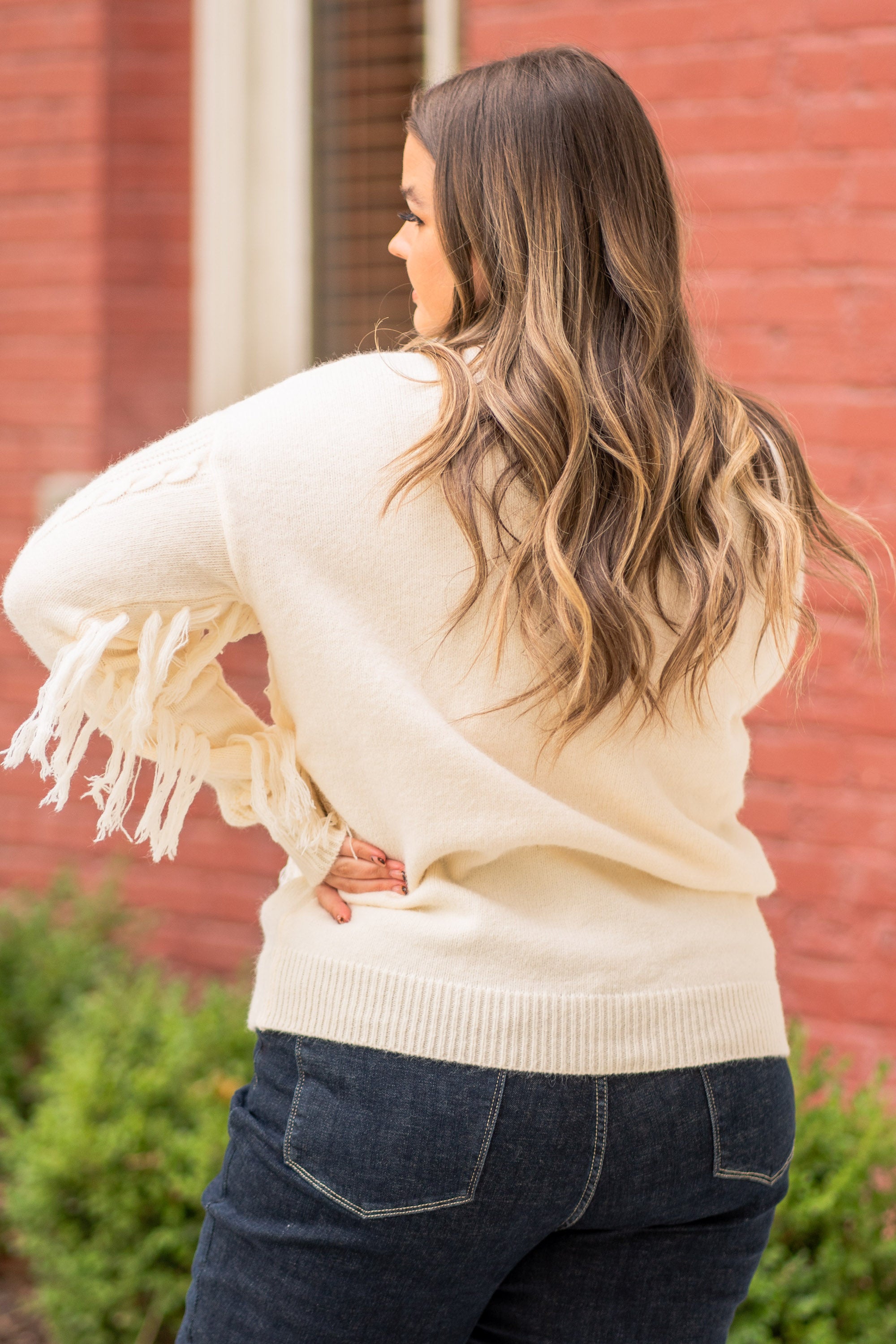 BiBi   Throw on for a warm casual look with your favorite jeans this fall.   Color: Cream Neckline: Crew Sleeve: Long Style #: IP7026  Contact us for any additional measurements or sizing.    