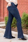 KanCan Jeans  KanCan Stretchy  Flare, 33" Inseam* High Rise, 9.75" Front Rise* Dark Blue Wash  53.5% COTTON, 39.3% RAYON, 5.6% POLYESTER, 1.6% SPANDEX Fly: Zipper Style #: KC7394D Contact us for any additional measurements or sizing.  *Measured on the smallest size, measurements may vary by size.  
