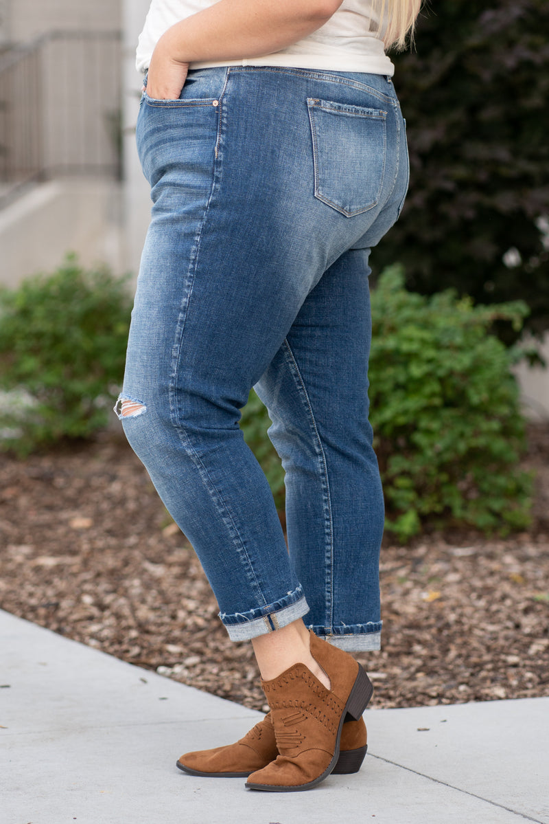 KanCan Jeans  These mid-rise boyfriend jeans hit at exactly the right spot on your waist and with some spandex, these will stretch as you wear and get super comfy!   KanCan Stretch Level: Comfort Stretch   Color: Medium Blue Wash Cut: Cuffed Boyfriend, 27" Inseam Rise: Mid-Rise, 9.25" Front Rise 99% COTTON, 1% SPANDEX Stitching: Classic  Fly: Zipper Style #: KC8645M-PL  Contact us for any additional measurements or sizing. 