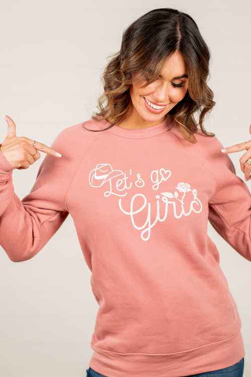Lets Go Girls! by Oat Collective   Color: Mauve Neckline: Round Sleeve: Long Sleeve Spun from plush sponge fleece fabric Ribbe Cuffed Wrist Bands Oversized Pull Over Style #: OT2106L510   Contact us for any additional measurements or sizing.    