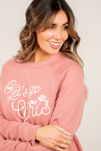 Lets Go Girls! by Oat Collective   Color: Mauve Neckline: Round Sleeve: Long Sleeve Spun from plush sponge fleece fabric Ribbe Cuffed Wrist Bands Oversized Pull Over Style #: OT2106L510   Contact us for any additional measurements or sizing.    
