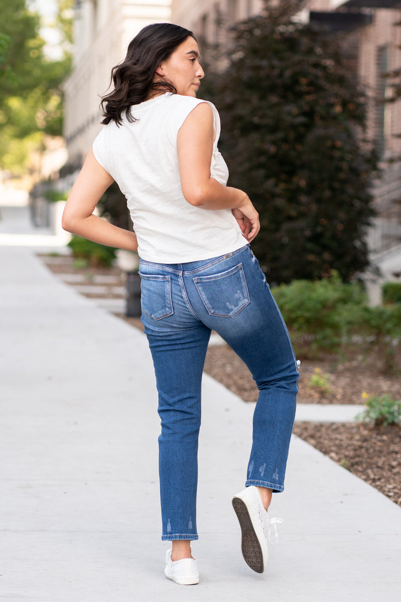 KanCan Jeans  These high-rise slim straight jeans hit at exactly the right spot on your waist and with some spandex, these will stretch as you wear and get super comfy!   KanCan Stretch Level: Comfort Stretch   Color: Medium Blue Wash Cut: Cuffed Boyfriend, 28.5" Inseam Rise: High-Rise, 10.5" Front Rise 93% COTTON, 5% POLYESTER, 2% SPANDEX Stitching: Classic  Fly: Zipper Style #: KC9253D Contact us for any additional measurements or sizing. 