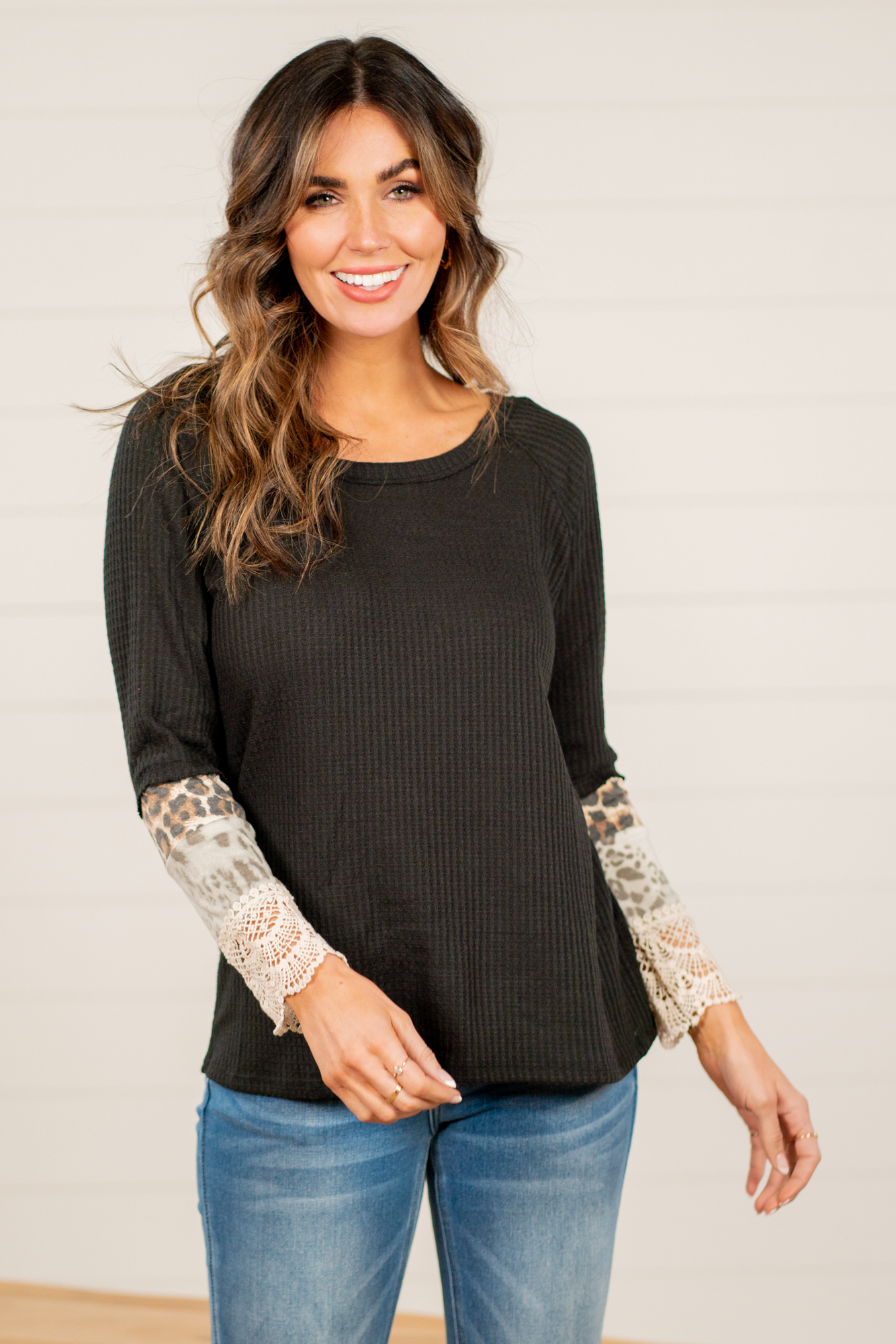 BiBi   Throw on for an easy casual look with your favorite jeans this fall.   Color: Black   Neckline: Round Sleeve: Long  Style #: BT2167 Contact us for any additional measurements or sizing.       