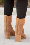 Boots by Oasis Society  These scrunched boots with zipper closures and block heels are great with skinny jeans and oversized cardigans this fall.  Color: Camel Man-made Upper Leather Wrap heel Padded footbed Shaft Height: 6.75" Heel Height: 3.25" Contact us for any additional measurements or sizing. 