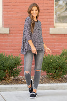 Hem & Thread   Feel comfortable and cute in this leopard knit top. Pair with your favorite jeans and booties for an early fall vibe.   Neckline: Round Neck Sleeve: Mid Length Style #: 31014F-Black Contact us for any additional measurements or sizing.   