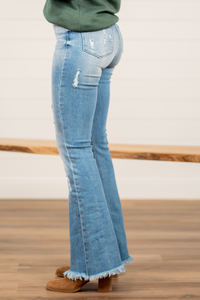 KanCan Jeans  KanCan Stretchy  Flare, 34" Inseam* High Rise, 11" Front Rise* Medium Blue Wash  94% COTTON, 4% T400, 2% SPANDEX Fly: Zipper  Style #: KC7904M Contact us for any additional measurements or sizing.  *Measured on the smallest size, measurements may vary by size.    
