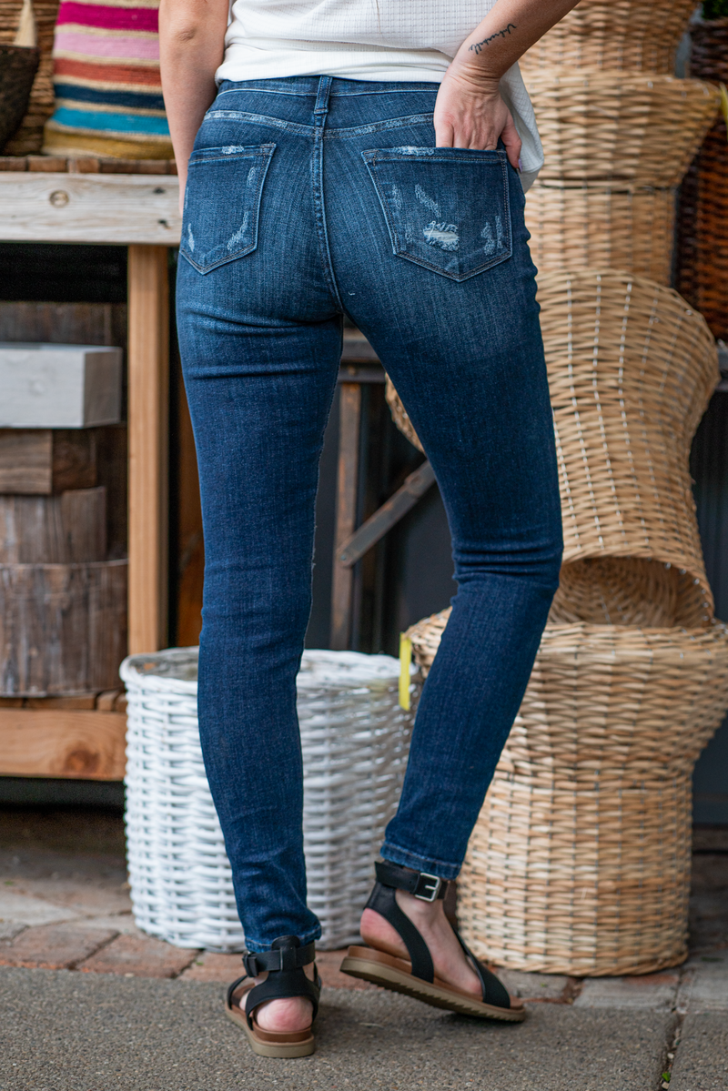 Kan Can Jeans Color: Dark Blue Wash  Cut: Skinny, 29" Inseam* Rise: High Rise, 11" Front Rise* 93% COTTON, 6% POLYESTER, 1% SPANDEX Fly: Zip Fly Style #: KC2509D Contact us for any additional measurements or sizing.   *Measured on the smallest size, measurements may vary by size.