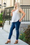 KanCan Maternity Jeans  Do you miss wearing jeans? These maternity jeans will keep you comfy and cute with an elastic stretch waistband that fits just under the tummy.   Color: Dark Wash Distressed Legs and Ankle Cut: Skinny, 27" Inseam Rise: Mid-Rise with Full Tummy Band, 5.5" Material: 94% COTTON, 4% T-400, 2% SPANDEX  Style #: KC3018M Contact us for any sizing questions or measurements.