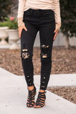 Judy Blue  These leopard filled distressed skinny jeans are iconic Judy Blues that you must have. Wear with white or black tees and sandals for an effortlessly chic look. Collection: Core Style Style Name: Leopard Patch Color: Black Cut: Skinny, 27" Inseam Rise: Mid-Rise, 9.5" Front Rise 66% COTTON 29% POLYESTER 11% RAYON 2% SPANDEX Machine Wash Separately In Cold Water Stitching: Classic Fly: Zipper Style #: JB82168 | 82168 Contact us for any additional measurements or sizing.