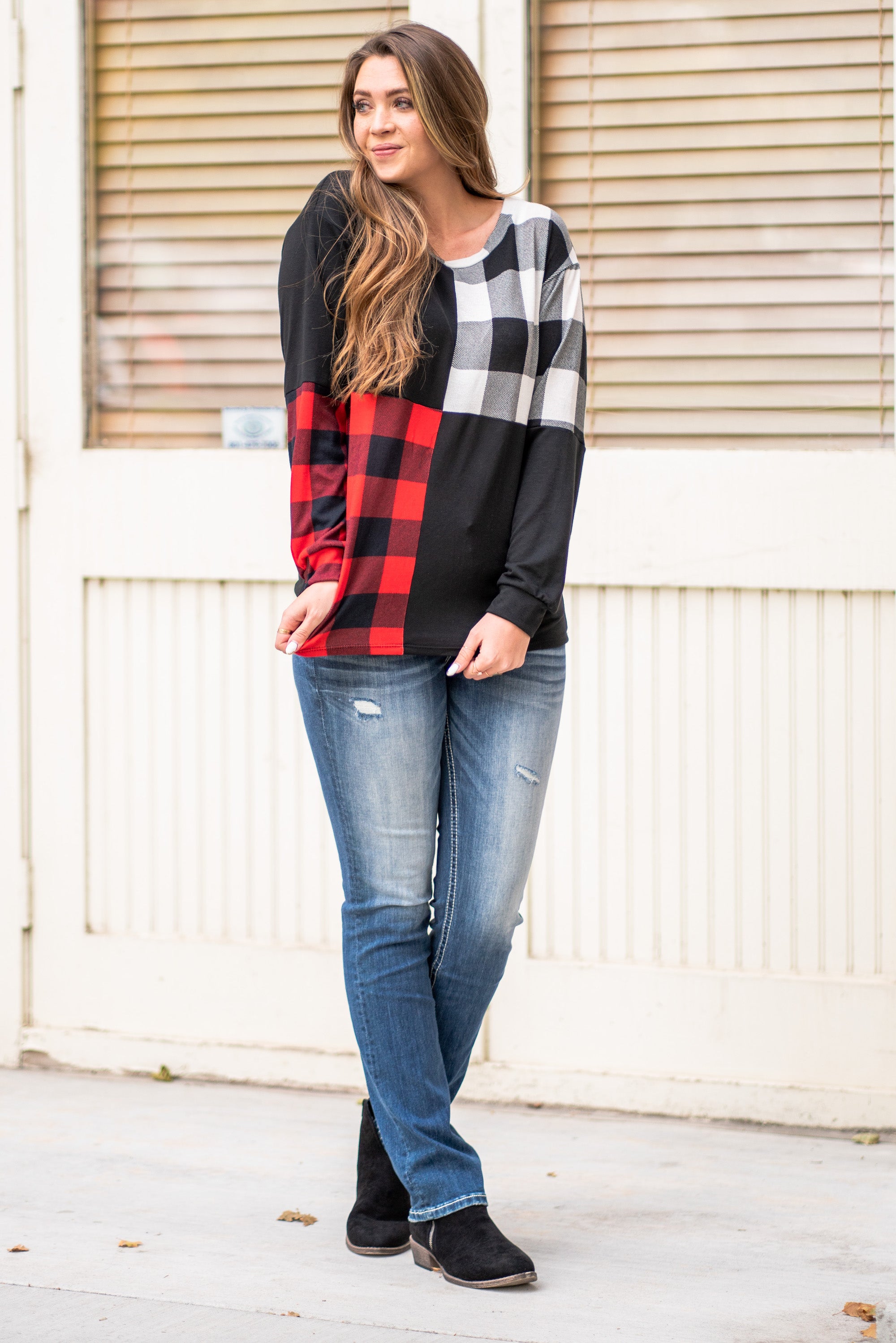 BiBi   Throw on for an easy casual look with your favorite jeans this fall.   Color: Black  Neckline: V Neck Sleeve: Long Style #: BT2116 Contact us for any additional measurements or sizing.    