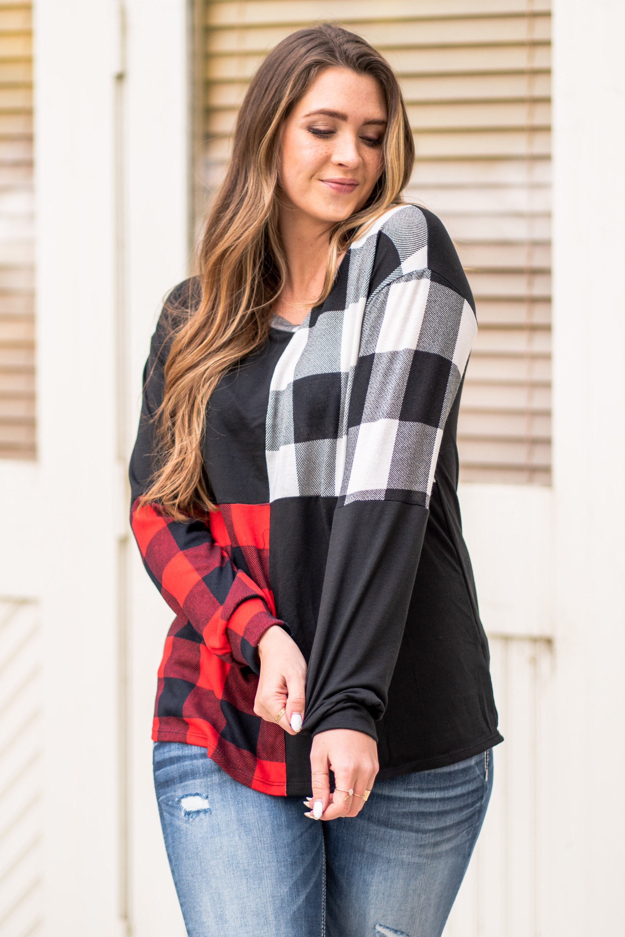 BiBi   Throw on for an easy casual look with your favorite jeans this fall.   Color: Black  Neckline: V Neck Sleeve: Long Style #: BT2116 Contact us for any additional measurements or sizing.    