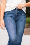 KanCan Jeans  Skinny jeans still hit the spot. These high-rise jeans hit at exactly the right spot on your waist and with some spandex, these will stretch as you wear and get super comfy!   KanCan Stretch Level: Comfort Stretch   Color: Dark Blue Cut: Ankle Skinny, 26.5" Inseam Rise: High-Rise, 9.5" Front Rise COTTON 94% POLYESTER 4% SPANDEX 2% Style #: KC7119D Contact us for any additional measurements or sizing.