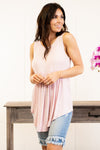 Reborn J  Pair this flowy top with a double row necklace and skinny jeans for a boho look.  Collection: Spring 2021 Color: Blush Pink Neckline: Round  Sleeve: Sleeveless  96% RAYON 4% SPANDEX Style #: T5438-SL3 Contact us for any additional measurements or sizing.  Chloe is 5’8" and 130 pounds. She wears a size 3 in jeans, a small top, and 8.5 in shoes. She is wearing a size small in this top.