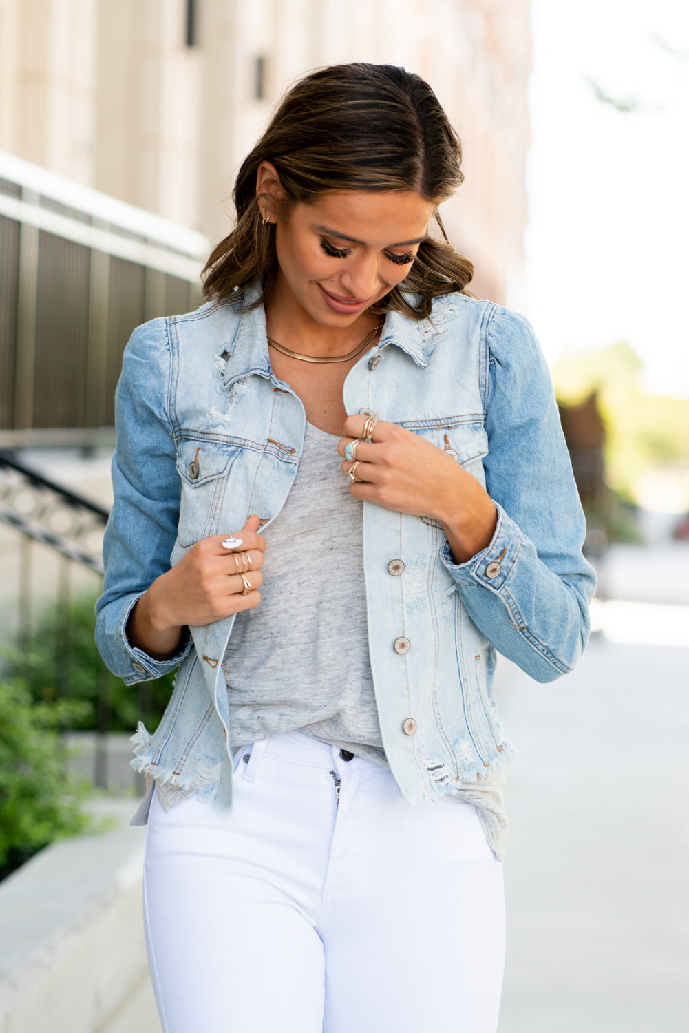 KanCan Jeans  Collection: Summer 2021 Color: Light Blue Wash Cut: Fitted Style Denim Jacket with Princess Sleeves Ripped & Distressed with Fray Hem 22.75" Length Material: 100% Cotton Stitching: Classic Style #: KC6344L Contact us for any additional measurements or sizing.