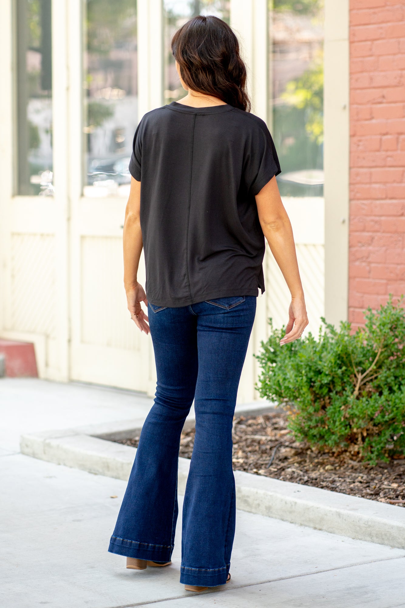 Thread & Supply  This classic V-neck tee is a forever favorite you'll be asking for in every color. Designed in a light and airy silhouette, and our signature soft fabric, this top is bound to keep you cool this season  Color: Graphite Neckline: V-Neck Sleeve: Short Sleeve 89% Polyester 11% Spandex Style #: T1502LZMTS-GY021 Contact us for any additional measurements or sizing. 