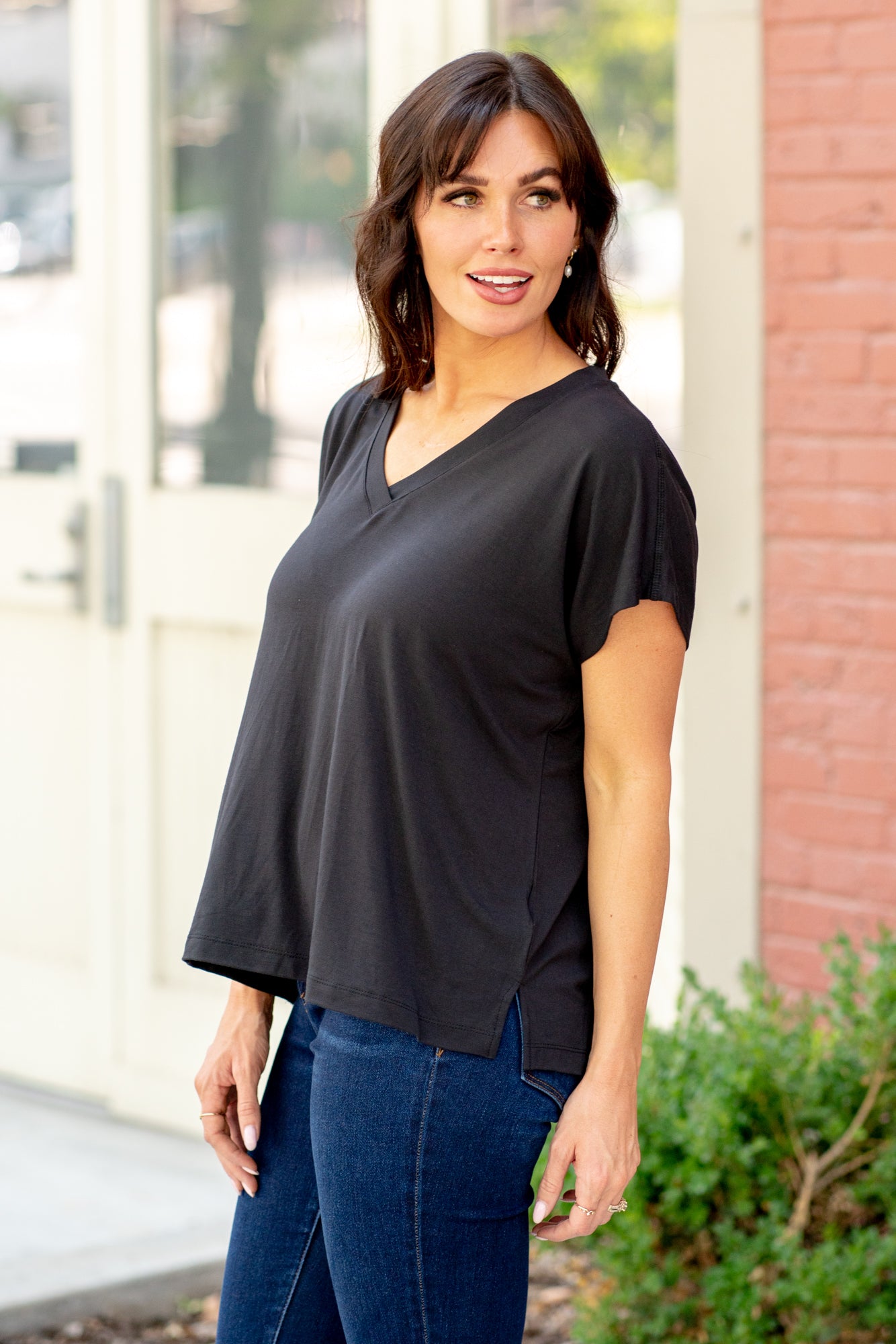 Thread & Supply  This classic V-neck tee is a forever favorite you'll be asking for in every color. Designed in a light and airy silhouette, and our signature soft fabric, this top is bound to keep you cool this season  Color: Graphite Neckline: V-Neck Sleeve: Short Sleeve 89% Polyester 11% Spandex Style #: T1502LZMTS-GY021 Contact us for any additional measurements or sizing. 