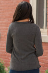 Blue Buttercup   The cutest ribbed henley. Pair with your favorite jeans and booties.  Color: Charcoal Black Neckline: Round Sleeve: Long with Thumb Holes   Style #: KT82696-CharcoalBlack Contact us for any additional measurements or sizing.  