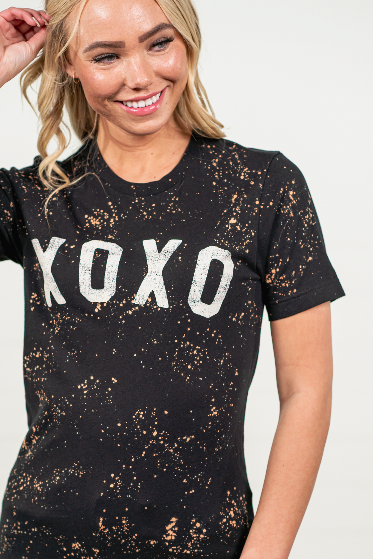 XOXO by Oat Collective   Graphic Fleece Pullover Relaxed Fit Crop   Color: Black Neckline: Round  Sleeve: Short Sleeve Relaxed Fit T Style #: OT2112X115  Contact us for any additional measurements or sizing.    