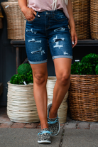 Judy Blue Jeans Color: Dark Blue Shorts   Cut: Bermudas Shorts, 8.5" Inseam  Rise: 10.5" Front Rise 91% COTTON,7% POLYESTER,2% RAYON Stitching: Classic  Fly: Zipper Fly Style #: JB150115-DK-PL | 150115-DK-PL Contact us for any additional measurements or sizing.  *Measured on the smallest size, measurements may vary by size. 