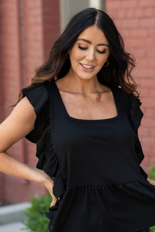BiBi   Color: Black Neckline: Square Sleeve: Ruffle Sleeve Material: Cotton/Spandex Mix Style #: BT2992-01-Black Contact us for any additional measurements or sizing.   