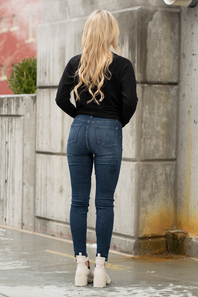 Judy Blue  Don't be afraid to wear high-waisted jeans, especially with this control top fit. Carefully designed by Judy Blue to hold your tummy in for a slim look. With a dark blue wash, these will be your everyday go-to denim.   Color: Dark Wash Cut: Skinny, 29" Inseam* Rise: High Rise, 10.5" Front Rise* Material: 91% COTTON,7% POLYESTER,2% RAYON Machine Wash Separately In Cold Water Stitching: Classic Fly: Zipper Style #: JB88326-PL , 88326-PL