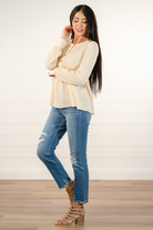 Blu Pepper Color: Oatmeal Long Sleeves Button Neckline Waffle Knit SELF: 97% POLYESTER 3% SPANDEX - CONT: 95% COTTON 5% SPANDEX Style #: BTST1184 Contact us for any additional measurements or sizing.