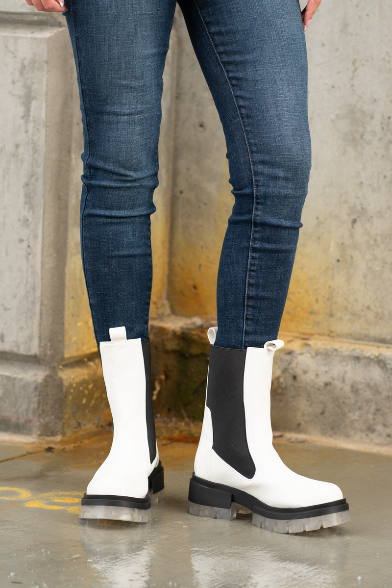 Boots by Qupid Style Name: Outshine Chelsea  Color: White Cut: Pull-On Open Boot 3" Stacked Heel Algae Foam Insole Material. Outsole: Rubber Upper: Textile/Manmade Recycled Material Contact us for any additional measurements or sizing.