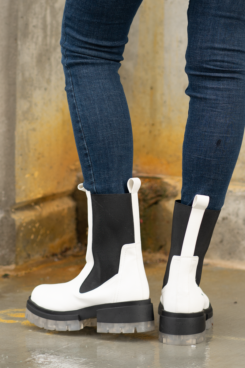 Boots by Qupid Style Name: Outshine Chelsea  Color: White Cut: Pull-On Open Boot 3" Stacked Heel Algae Foam Insole Material. Outsole: Rubber Upper: Textile/Manmade Recycled Material Contact us for any additional measurements or sizing.
