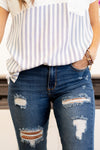 Cello Jeans  Featuring distressed detailing throughout keeps this pant edgy and chic. Additionally the unique step hem adds a fun twist in your everyday jeans. Crafted with five pockets, belt loops and a zip fly closure. Collection: Spring 2021 Color: Medium Blue Wash  Cut: Crop Ankle Skinny, 27" Inseam Rise: Mid-Rise, 9.5" Front Rise 77% Cotton 18% Polyester 4% Rayon 1% Spandex Fly: Zipper Style #: WV77638M Contact us for any additional measurements or sizing.