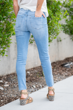 Denim by Zenana   Color: : Light Blue Cut: Skinny Fit, 28" Inseam*  Rise: High-Rise, 10.25" Front Rise* 98% COTTON 2% SPANDEX Fly: Zipper  Style #: DOP-1620LL Contact us for any additional measurements or sizing.    *Measured on the smallest size, measurements may vary by size.  
