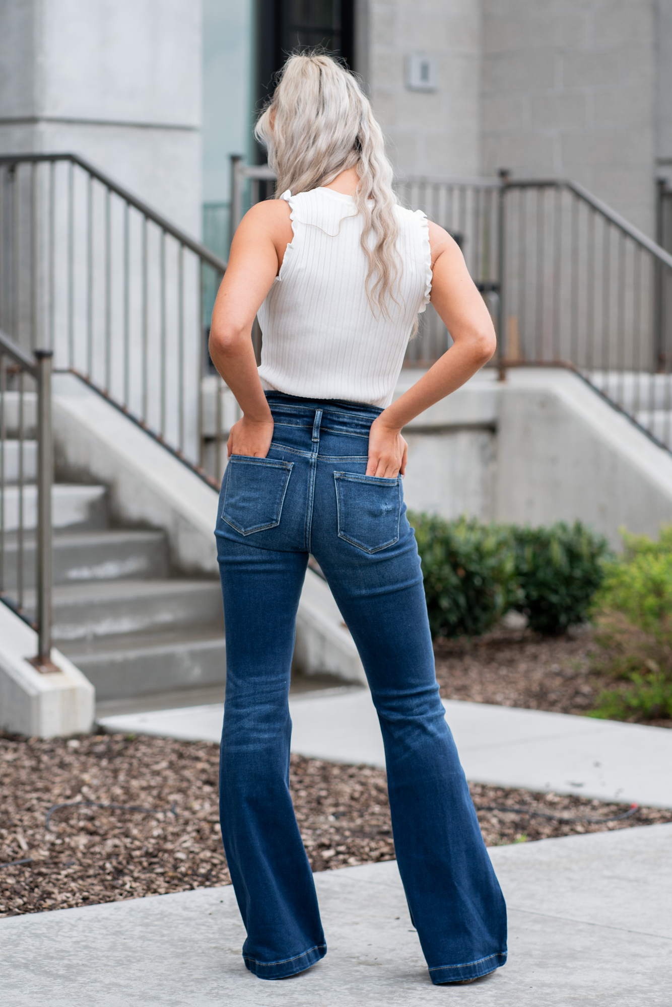 KanCan Jeans   KanCan Stretch Level: Comfort Stretch  Curvy Fit Flare   Color: Dark Blue Wash Cut: Flare, 33" Inseam  Rise: High Rise, 11" Front Rise 95% COTTON, 4% POLYESTER, 1% LYCRA Fly: Exposed Button Fly Style #: KC8602D-CV Contact us for any additional measurements or sizing.  *Measured on the smallest size, measurements may vary by size. 