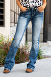 Miss Me  Wear these big stitched boot cut jeans every day to bling up your wardrobe. Boot cut jeans featuring a 5 pocket design, whiskering, and crystal rivets. Collection: Spring 2021 Wash: Dark Blue Inseam: 34" Boot Cut Mid Rise, 8.75" Front Rise Silver Buttons and Rivets  Style #: M5014B355 Contact us for any additional measurements or sizing.