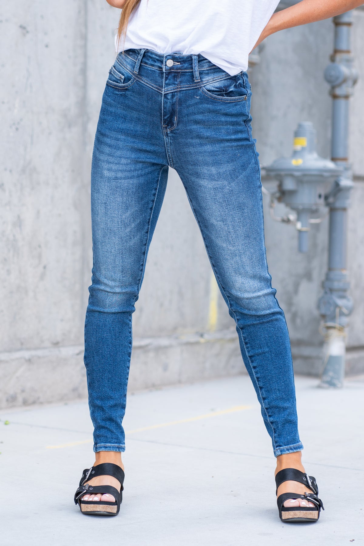 Judy Blue  Don't be afraid to wear high-waisted jeans, especially this western yoke fit. With a dark blue wash, these will be new favorites!   Color: Dark Blue Cut: Skinny, 28.5" Inseam* Rise: High Rise, 11" Front Rise* Material: 94% Cotton / 5% Polyester / 1% Spandex Machine Wash Separately In Cold Water Stitching: Classic Fly: Zipper Style #: JB 88364 -PL , 88364-PL Contact us for any additional measurements or sizing.  *Measured on the smallest size, measurements may vary by size.
