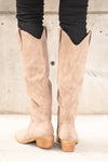 Boots by Oasis Society  A western knee high boot with a zipper and block heel with a v cut to elongate the legs. Color: Taupe Man-made Upper Leather Wrap heel Padded footbed Shaft Height: 15" Heel Height: 2" Contact us for any additional measurements or sizing. 
